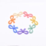 樹脂貼付けパーツ リボン 49x27mm 【20ヶ(約56g)】